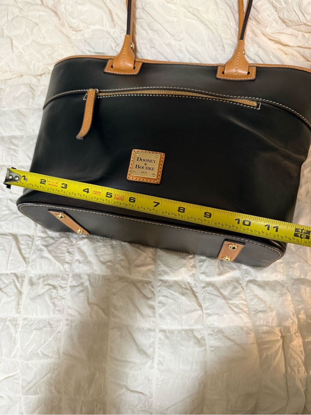 Dooney & Bourke Black Leather Duffel with Tan Trim